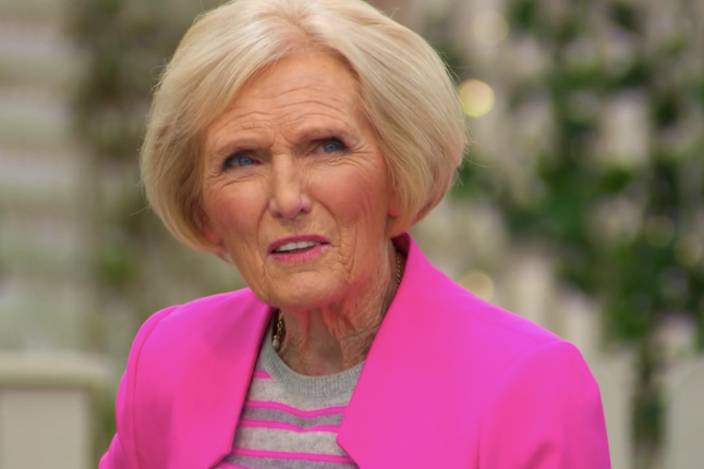 TV cook, Mary Berry, wearing a bright pink blazer